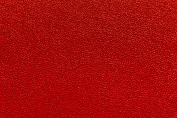 Close-Up Red Leather Texture or Background Close-up natural red leather texture for background and furniture materials fake leather stock pictures, royalty-free photos & images