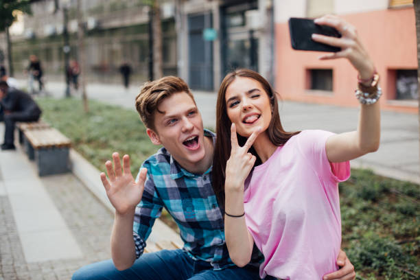 istock Funny couple taking selfie 1159441610