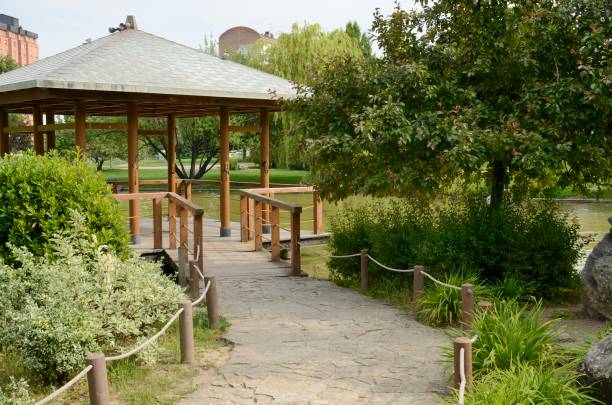 istock Stone path to garden kiosk 1159446423