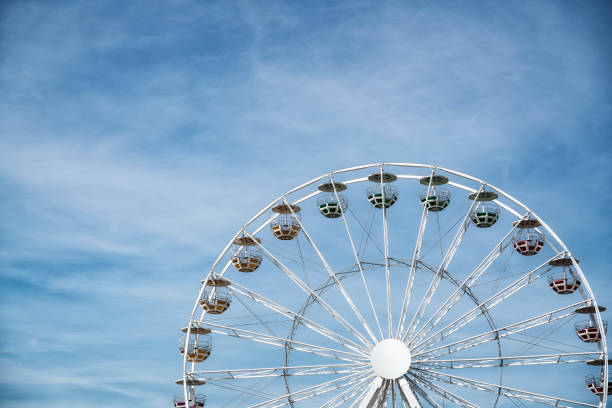 istock Ferris Mill, big  wheel on a background of blue sky. 1159448021