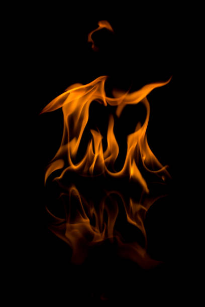 istock Flames with a black background. Close up. 1159448973
