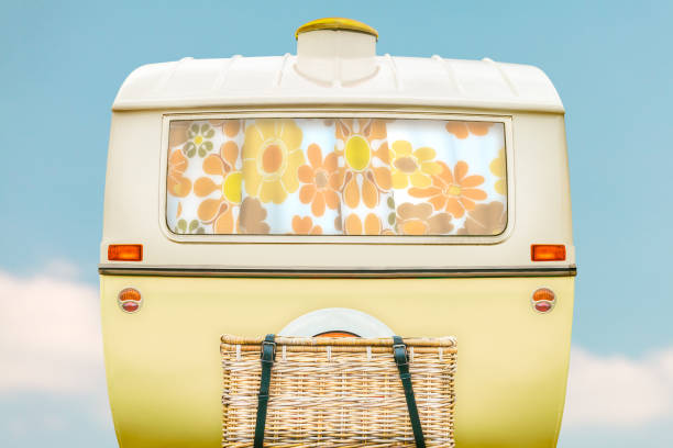 istock Vintage caravan in two tone yellow and white 1159452157
