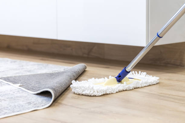 istock Wooden floor with white mop, cleaning service concept 1159452401
