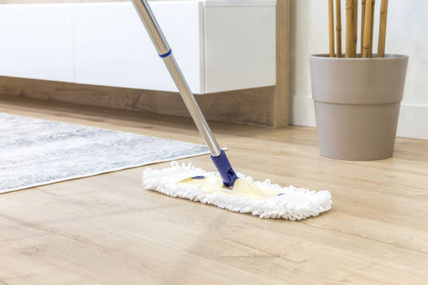 istock Wooden floor with white mop, cleaning service concept 1159452429