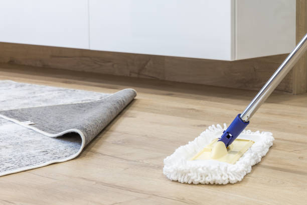 istock Wooden floor with white mop, cleaning service concept 1159452471
