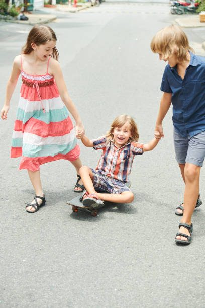 istock Children playing in the street 1159453661