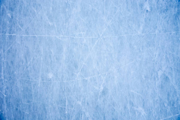 istock Texture of blue ice surface with skate scratches 1159454071