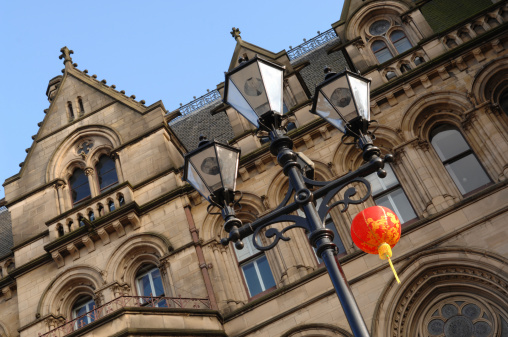 A Chinese lantern hanging on a street lamp outside Manchester town hall during the Chinese New Year festival.