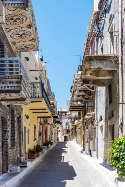 istock Traditional houses decorated with the famous geometric scratch patterns in the medieval mastic village of Pyrgi on the island of Chios, Greece 1159454428