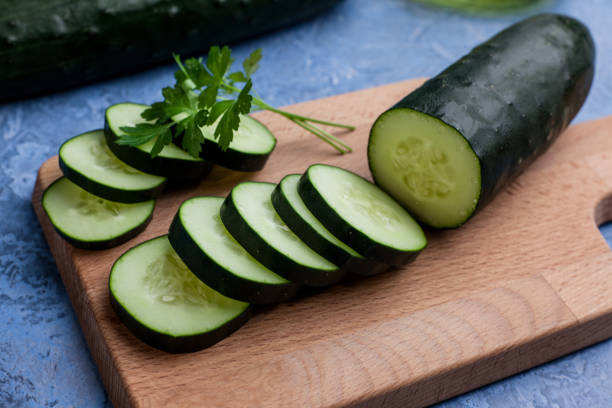 istock Cucumber chopped ona cutting board 1159456522