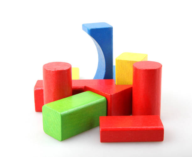 istock Wooden building blocks isolated on white 1159458013