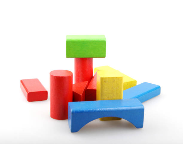 istock Wooden building blocks isolated on white 1159458063