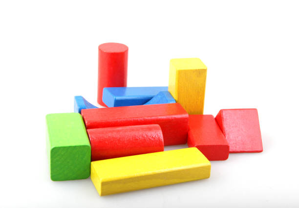 istock Wooden building blocks isolated on white 1159458066