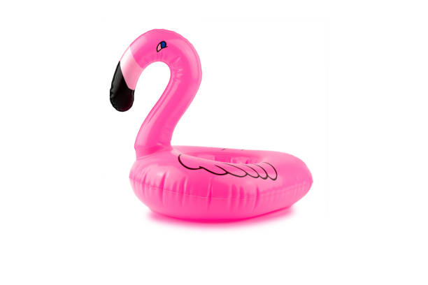 istock Giant inflatable pink flamingo on a white background. Pool float party. Summer concept. 1159459233