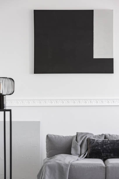 istock Monochrome grey, white and black living room interior with sofa 1159460413