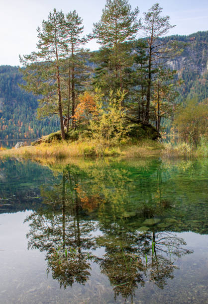 istock Reflections of the sunrise at the Eibsee 1159461347