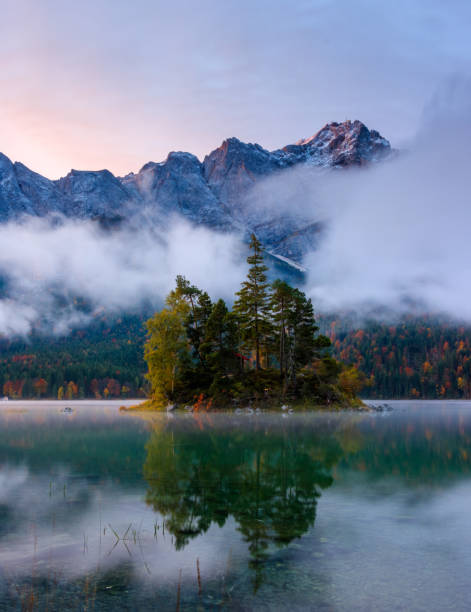 istock Reflections of the sunrise at the Eibsee 1159461415