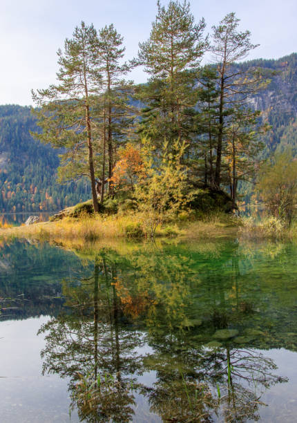 istock Reflections of the sunrise at the Eibsee 1159461753
