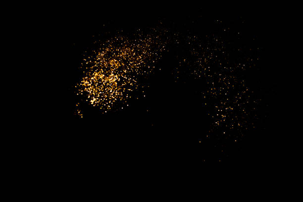 istock Golden abstract bokeh on black background. 1159461864