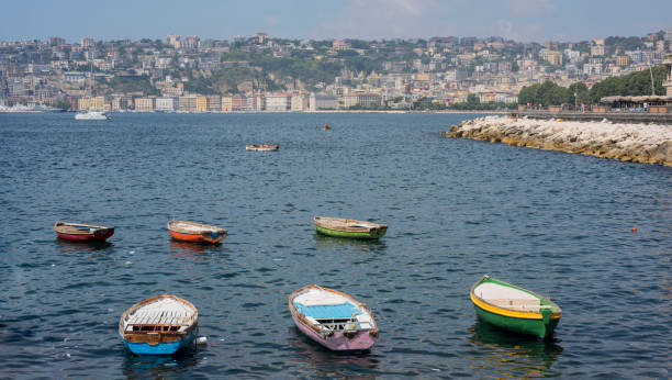 istock Small colored boats on water. Sunny summer day. 1159461914