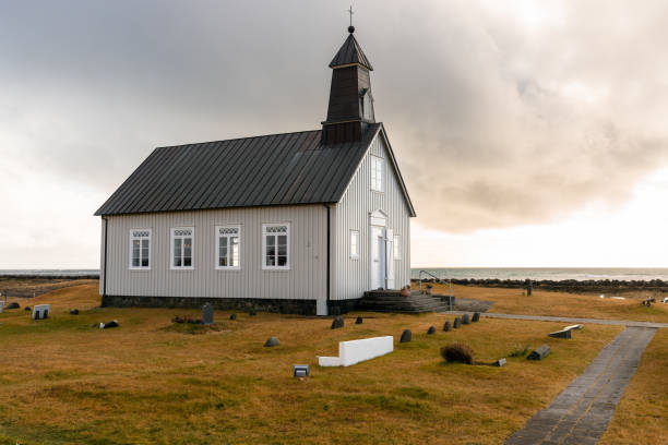 istock lonely chapel under cloudy sky in Iceland in autumn 1159462133