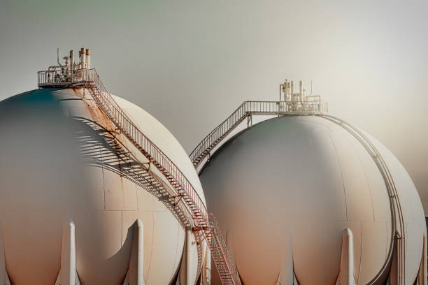 Sphere gas tanks in refiney plant Sphere gas tanks in refiney plant liquefied petroleum gas photos stock pictures, royalty-free photos & images