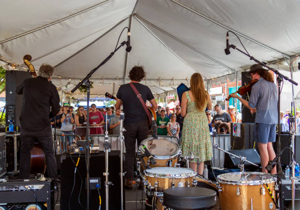 The Moonshine plays under the tent at the AthFest music and arts festival. stock photo