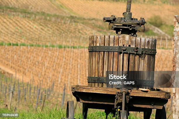 Old Wooden Winepress In Front Of The Vineyards Stock Photo - Download Image Now - Agricultural Equipment, Agriculture, Beaune
