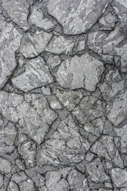istock Stone floor texture. Harmonic pattern of slate tiles at the floor. 1159464836