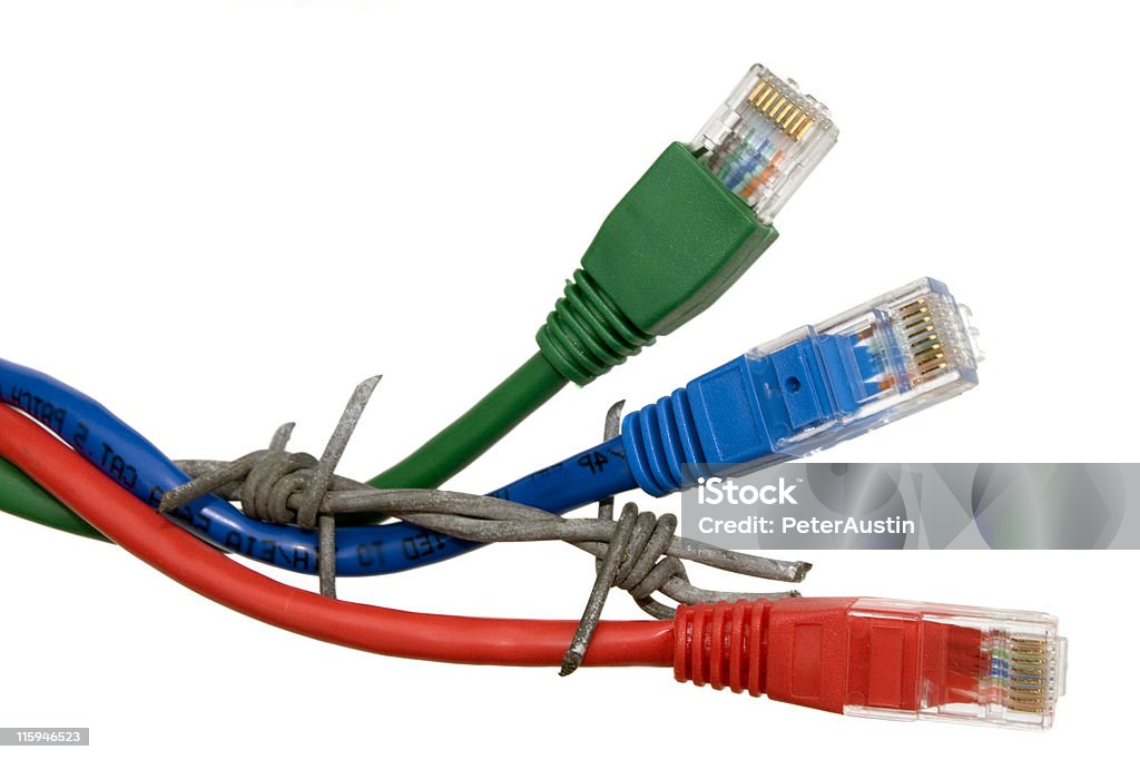 Network Firewall Network cables around barb wire. Bandwidth Stock Photo