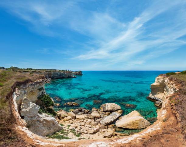 istock Faraglioni at Torre Sant Andrea, Italy 1159469408