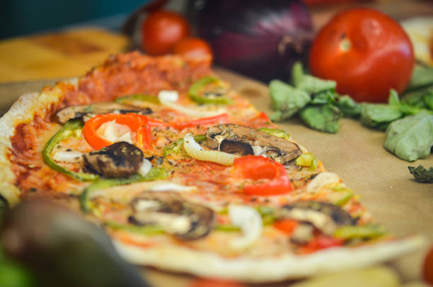 istock fresh italian pizza - close up view 1159469448