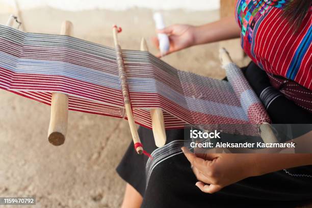 Hands Of A Woman Weaving On An Old Wooden Loom Stock Photo - Download Image Now - Guatemala, Weaving, Distorted Image