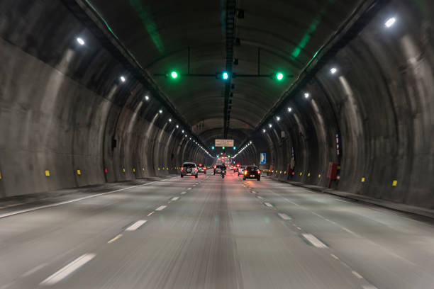 Tunnel on road with car traffic stock photo