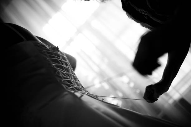 istock Lacing the wedding dress. 1159473472