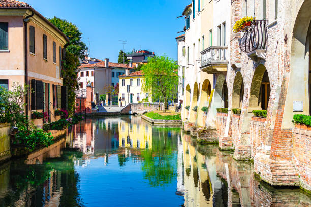 Ancient palace on the Buranelli canal in Treviso (Veneto, Italy). stock photo