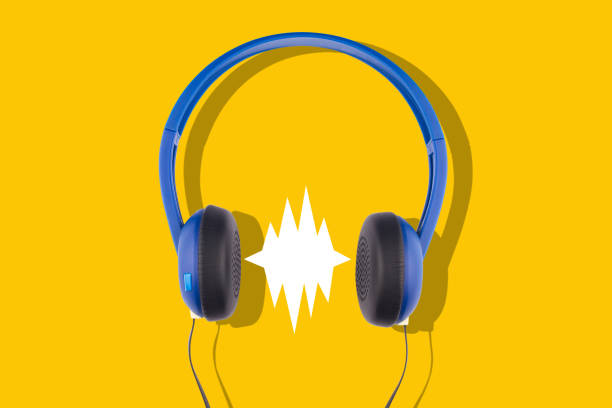 istock blue headphones isolated on yellow background 1159483018