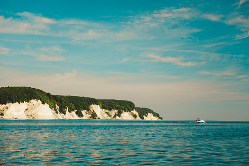 Sassnitz. The famous chalk cliffs shoreline of Jasmund National Park ruegen island germany, view from yacht boat
