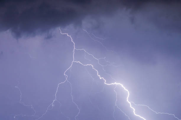 istock lightnings and thunder bold strike at summer storm 1159483188