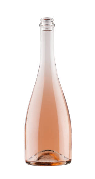 botella de champán rosa aislado en blanco - pink salmon fotografías e imágenes de stock