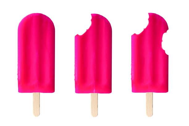 Pink popsicles with increasing number of bites removed isolated on a white background