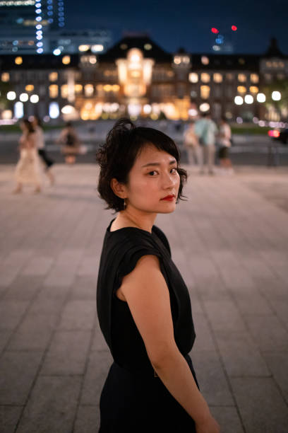 istock Young business woman looking over should on her way back home 1159484897