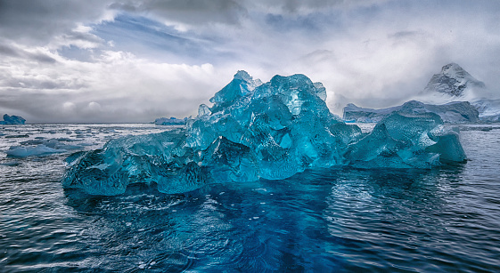 Blue iceberg in off the coast of Antarctica