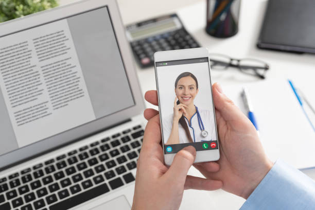 istock Doctor with a stethoscope. Telehealth conference. 1159486036