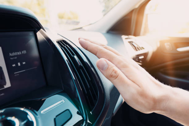 hand checking the air conditioner in the car - air vehicle fotos imagens e fotografias de stock