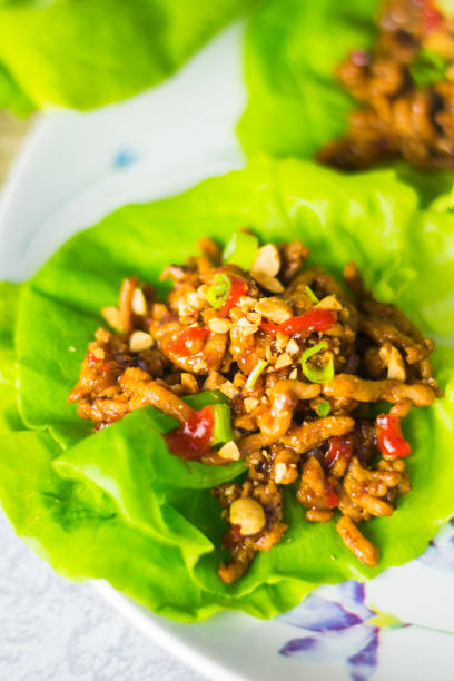 istock Asian Chicken Lettuce Wraps with Sriracha. 1159487346