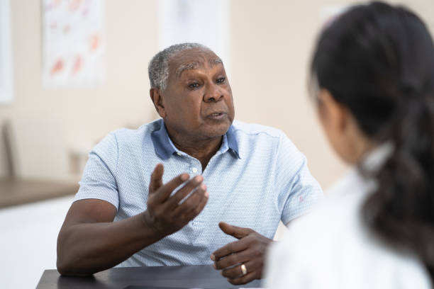 istock Senior man talking to doctor 1159495138