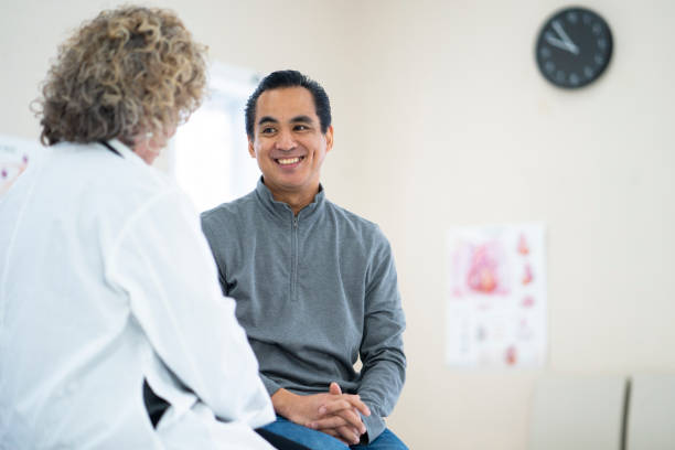 istock Latino patient talking to the doctor 1159495167