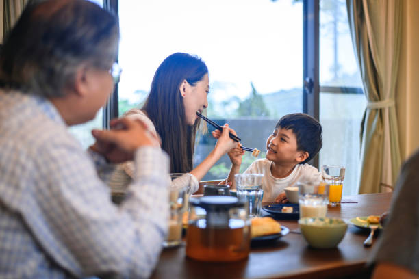 istock Taiwanese Mother and Son at Breakfast 1159495255