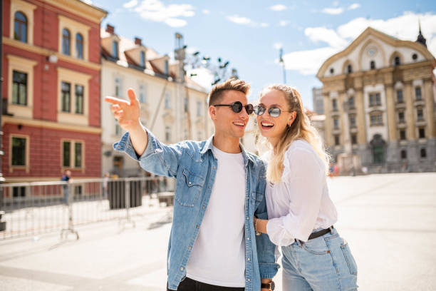 istock Young couple walking in a city 1159496727